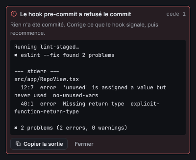 Le panneau d’échec du hook avec le nom du hook, le code de sortie et la sortie du hook, ainsi que les boutons Copier la sortie et Fermer