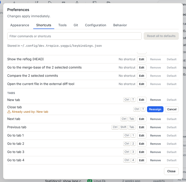 A shortcut capture showing Already used by: New tab, with the Reassign and Cancel buttons
