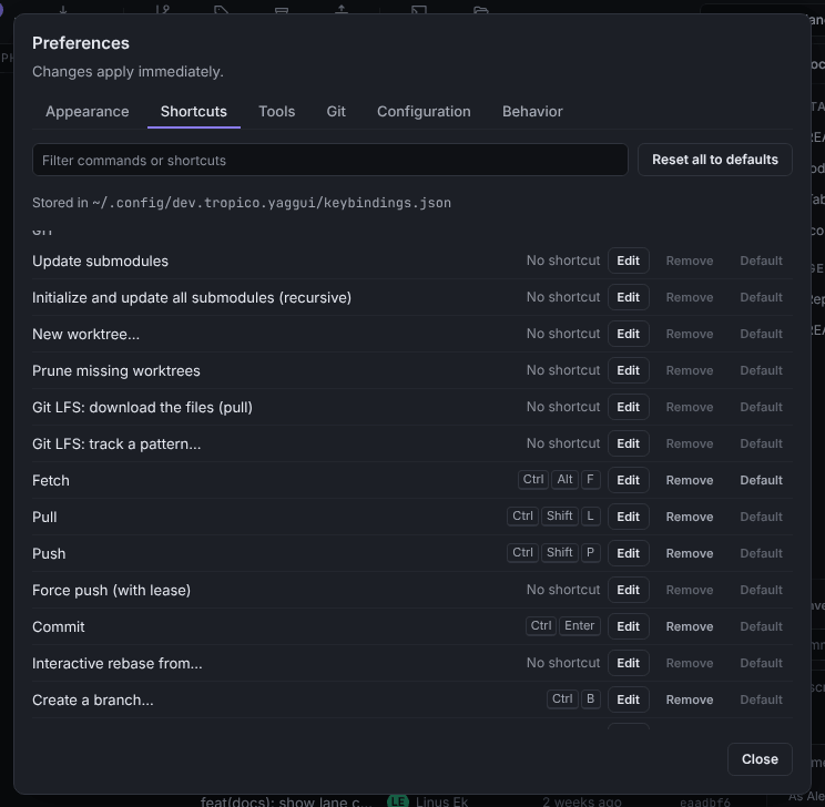 The Shortcuts tab of the preferences, with commands grouped by section and Edit, Remove and Default buttons on each row