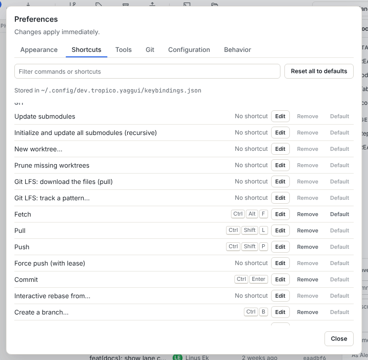 The Shortcuts tab of the preferences, with commands grouped by section and Edit, Remove and Default buttons on each row