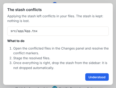 The stash conflicts dialog listing the conflicted files and the three steps to follow